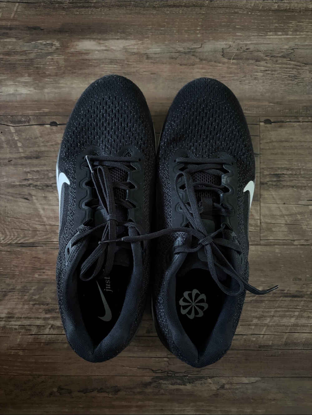 Nike Women’s Black Running Sneakers with White Swoosh